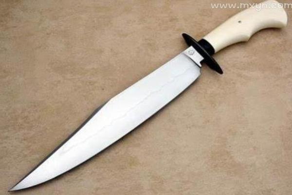 梦见拿刀砍人什么意思